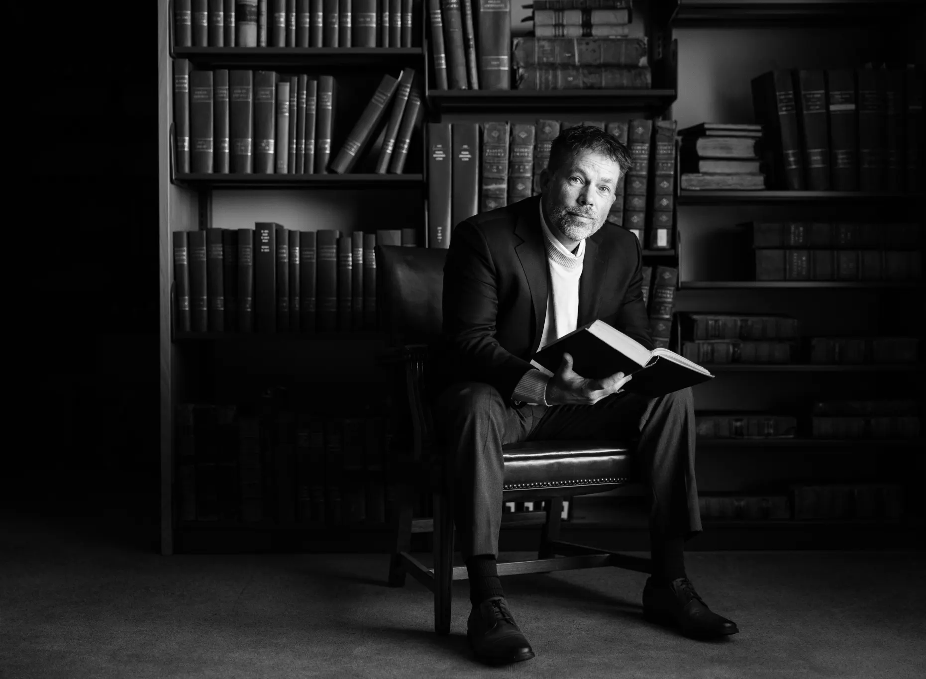 Don Seitz, founder and broker of Your Largest Investment, in the law library